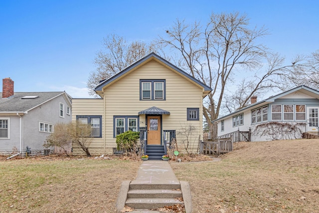 view of front of home with a front yard
