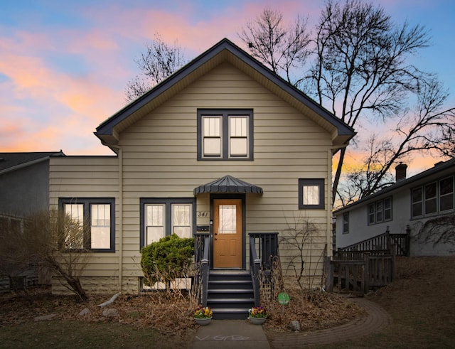 view of front of property featuring a standing seam roof and metal roof