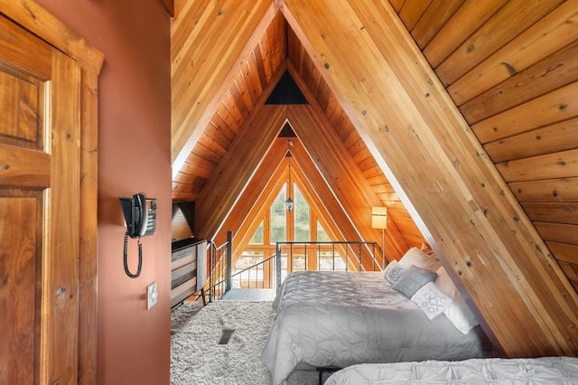 bedroom with vaulted ceiling and wood ceiling