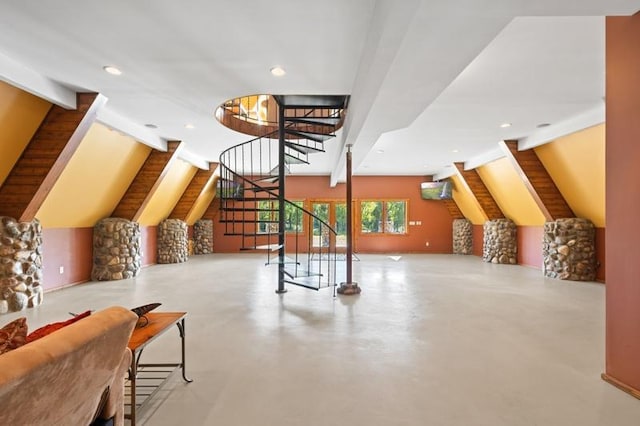 additional living space with recessed lighting, stairs, beamed ceiling, high vaulted ceiling, and concrete flooring