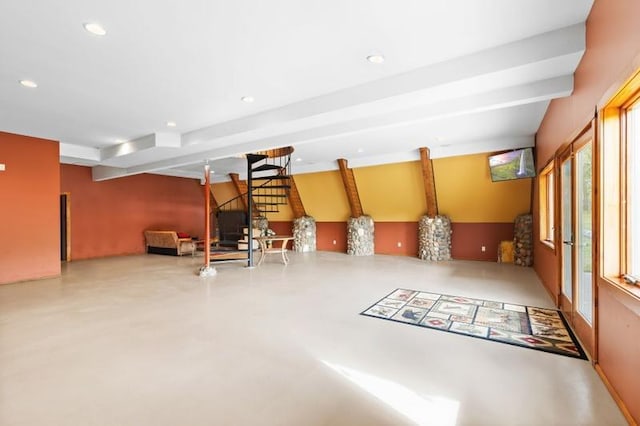 below grade area with recessed lighting and stairs