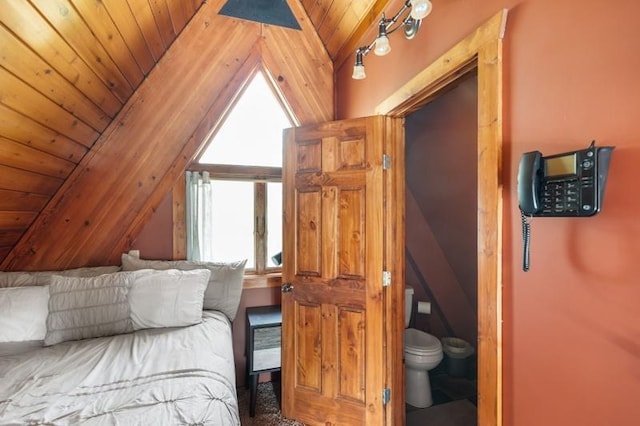 bedroom featuring wood ceiling and lofted ceiling