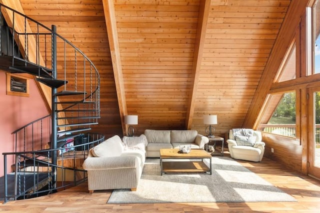 living room featuring wood walls, wood ceiling, lofted ceiling with beams, and wood finished floors