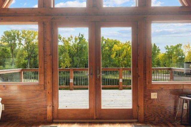 entryway with french doors and wood finished floors