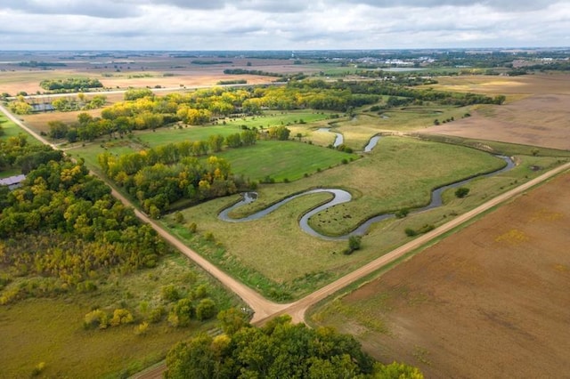 birds eye view of property with a rural view