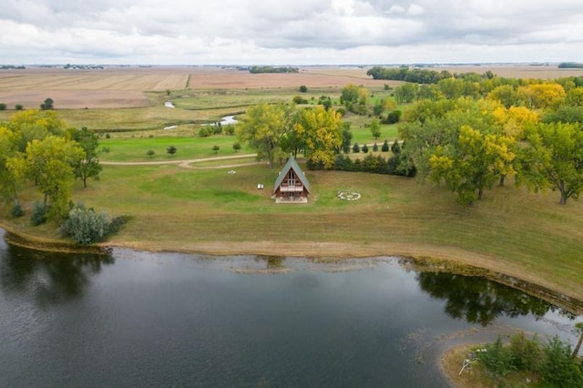 drone / aerial view with a rural view and a water view