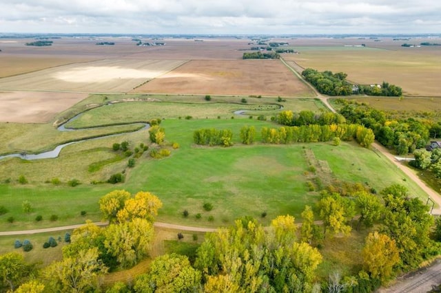 birds eye view of property featuring a rural view