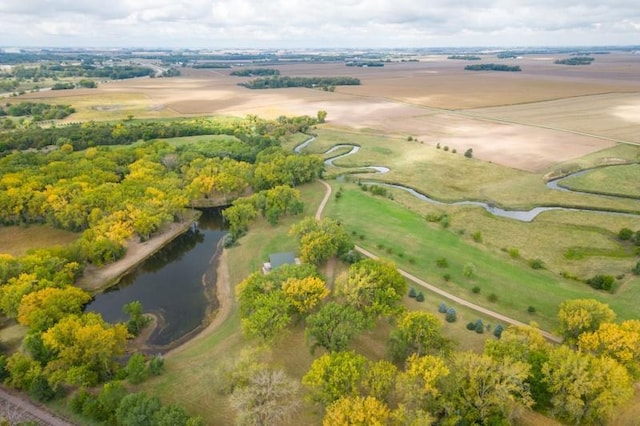 aerial view with a rural view and a water view