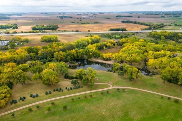 aerial view featuring a water view and a rural view
