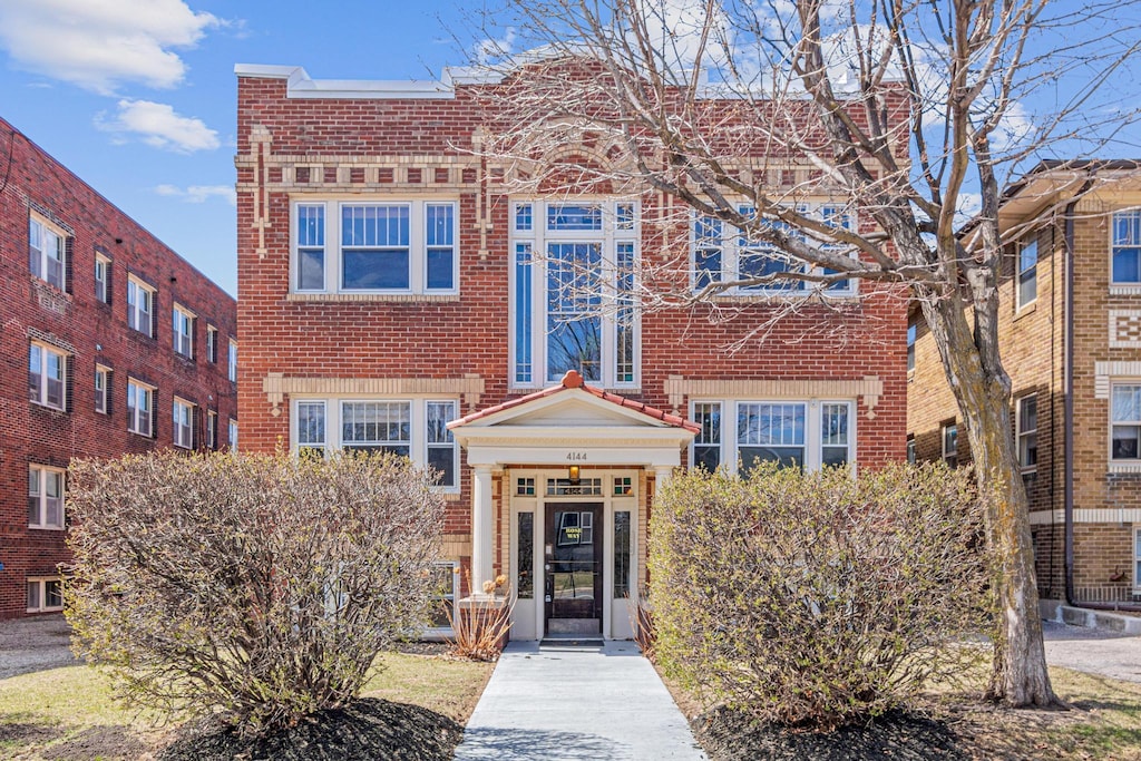 4144 Bryant Ave S Unit 1, Minneapolis, MN 55409 - view of front of home featuring brick siding