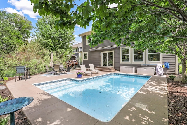 12566 Xylite St NE, Blaine, MN 55449 - outdoor pool featuring a patio area