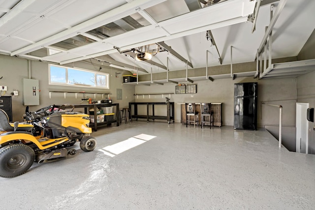 12329 Timber Ln, Maple Grove, MN 55369 - garage featuring freestanding refrigerator, a garage door opener, and electric panel