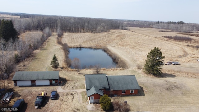 aerial view with a rural view and a water view