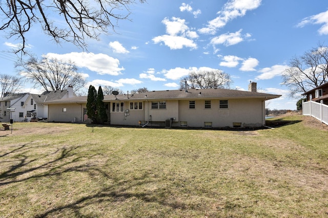 rear view of house with a chimney
