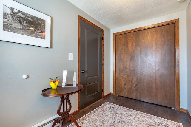 918 Division St, Elbow Lake, MN 56531 - foyer entrance with baseboards and a textured ceiling