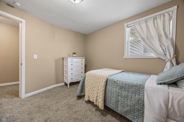 804 8th St N Unit 2, Fargo, ND 58102 - bedroom with carpet and a textured ceiling