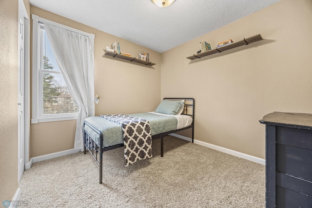 804 8th St N Unit 2, Fargo, ND 58102 - bedroom featuring carpet and a textured ceiling