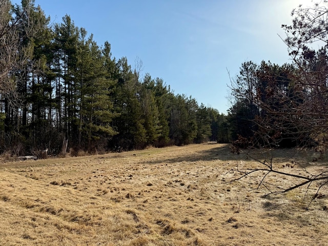 view of landscape featuring a view of trees
