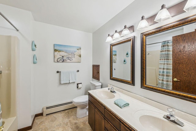 bathroom with a baseboard radiator, curtained shower, toilet, and a sink