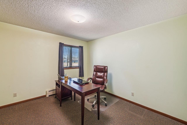 carpeted office space featuring baseboard heating, baseboards, and a textured ceiling
