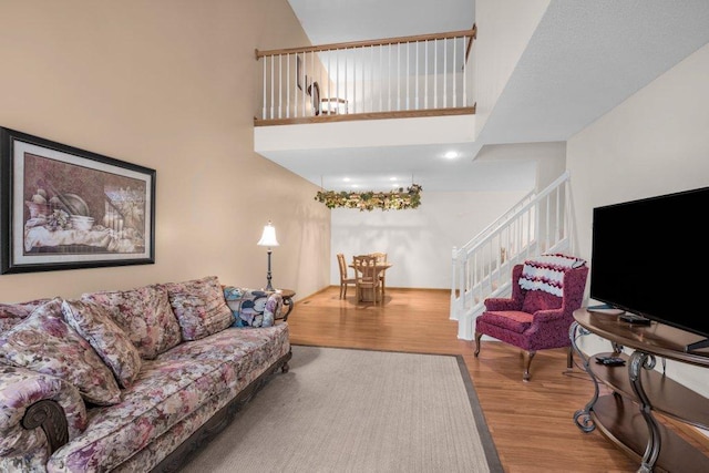 12626 43rd St NE, Saint Michael, MN 55376 - living room with wood finished floors, stairs, and a high ceiling
