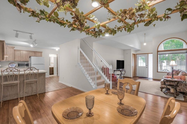 12626 43rd St NE, Saint Michael, MN 55376 - dining space with stairway, light wood-type flooring, and baseboards