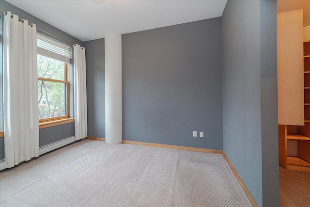 401 2nd St N Unit 220, Minneapolis, MN 55401 - carpeted empty room featuring baseboards and baseboard heating