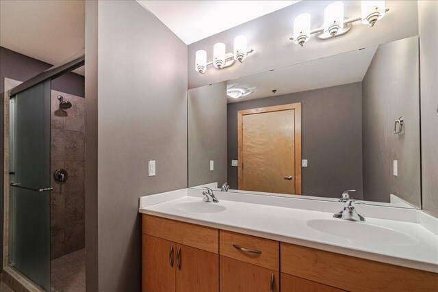 401 2nd St N Unit 220, Minneapolis, MN 55401 - full bath featuring double vanity, a stall shower, and a sink