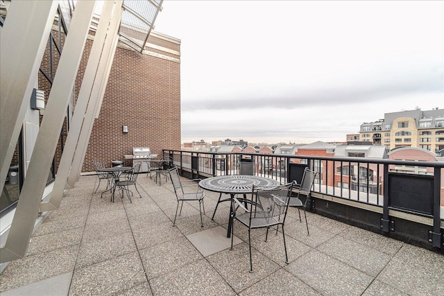 401 2nd St N Unit 220, Minneapolis, MN 55401 - balcony featuring grilling area and outdoor dining space