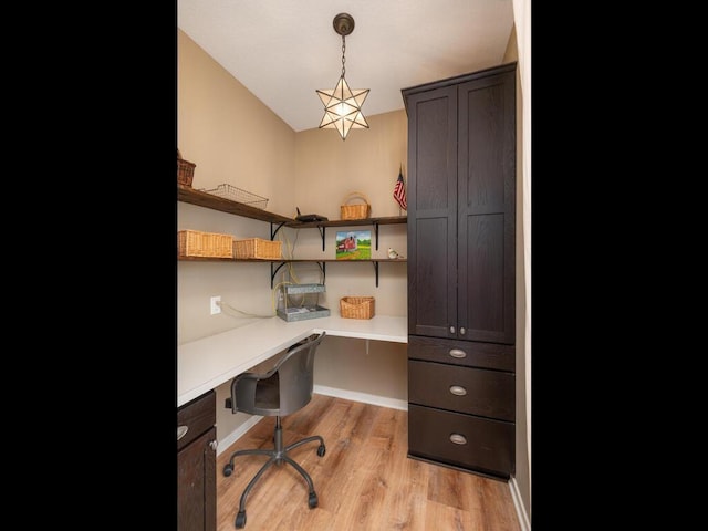 11460 Eagle Creek Ln, Rogers, MN 55374 - office space featuring built in study area, light wood-style floors, and baseboards