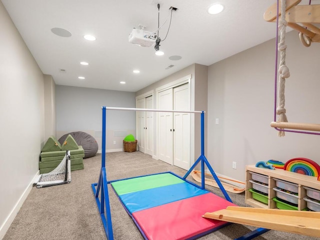 11460 Eagle Creek Ln, Rogers, MN 55374 - rec room with recessed lighting, carpet floors, and baseboards