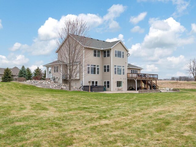 11460 Eagle Creek Ln, Rogers, MN 55374 - back of house with a deck, a patio, a hot tub, a yard, and stairway