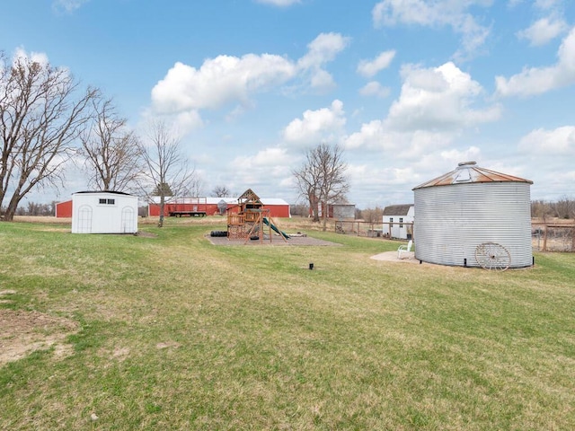 11460 Eagle Creek Ln, Rogers, MN 55374 - view of green lawn featuring a playground