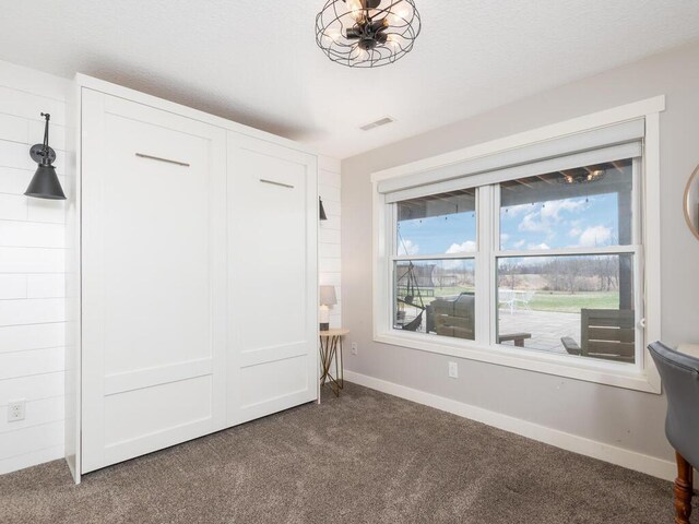 11460 Eagle Creek Ln, Rogers, MN 55374 - unfurnished bedroom with carpet floors, baseboards, and a closet