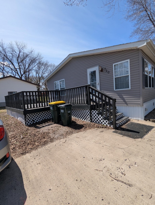 720 2nd St E, Lake Lillian, MN 56253 - exterior space featuring a deck
