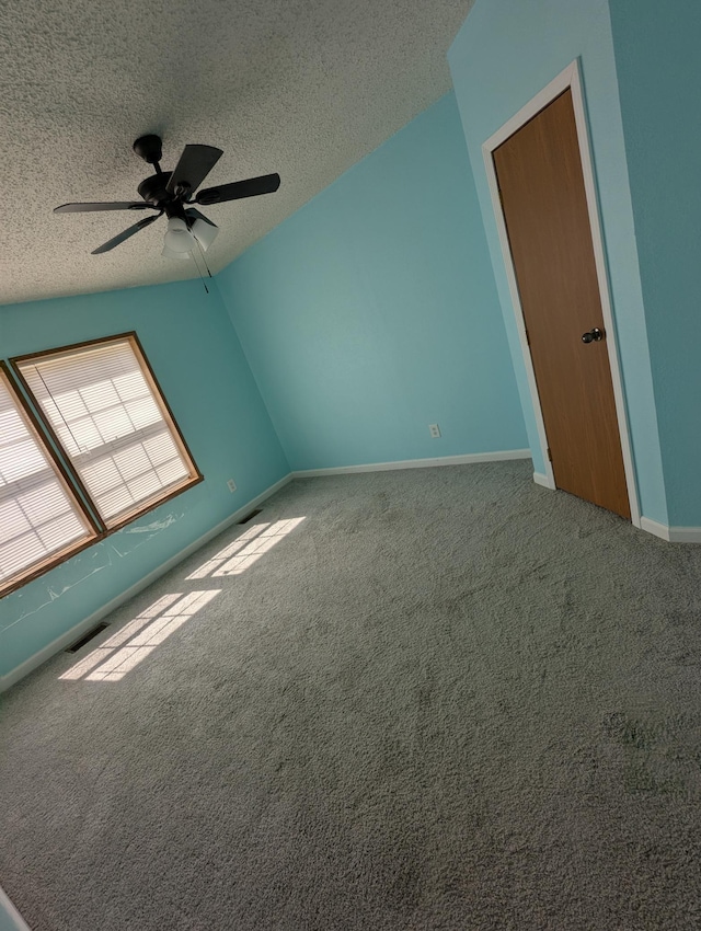 720 2nd St E, Lake Lillian, MN 56253 - carpeted empty room with baseboards, a ceiling fan, a textured ceiling, and visible vents