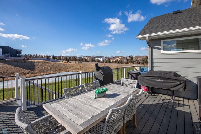 17917 Hayes Ave, Lakeville, MN 55044 - wooden terrace featuring outdoor dining space, a lawn, and area for grilling