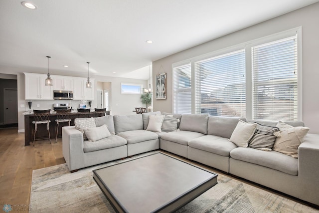 17917 Hayes Ave, Lakeville, MN 55044 - living area featuring light wood-style flooring and recessed lighting
