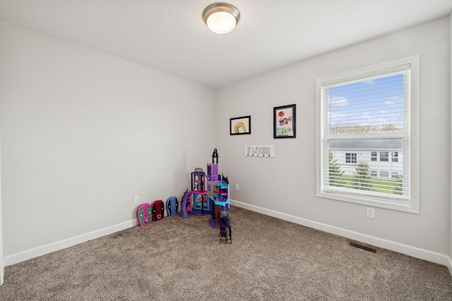 12985 Legacy Creek Pkwy NE, Blaine, MN 55449 - game room featuring carpet and baseboards