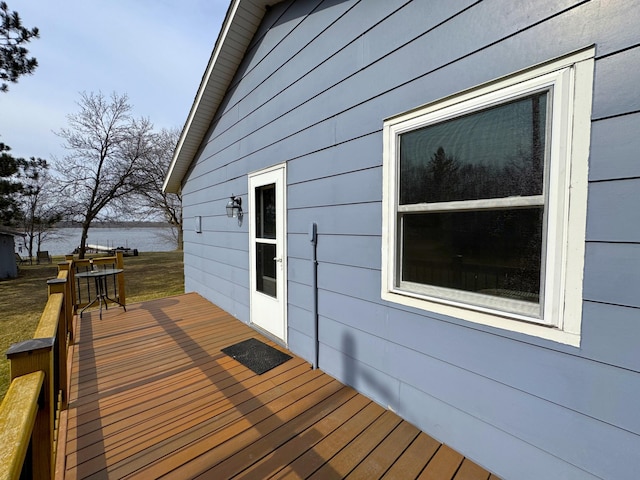 deck featuring a water view