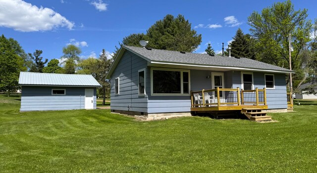 36777 311th Ln, Aitkin, MN 56431 - view of front of property with a wooden deck and a front yard