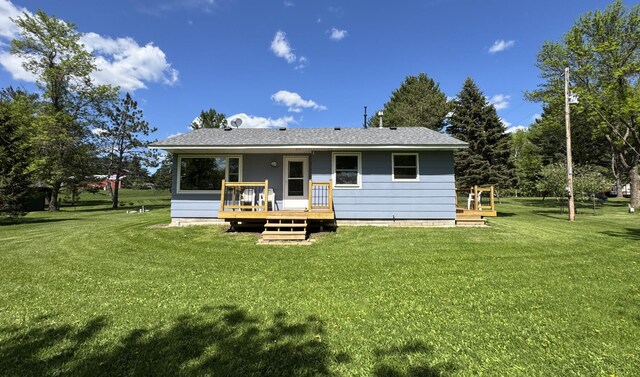 36777 311th Ln, Aitkin, MN 56431 - rear view of property with a wooden deck and a yard