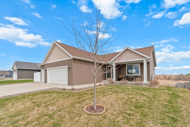 907 7th Ave, Wanamingo, MN 55983 - ranch-style home with an attached garage, concrete driveway, and a porch