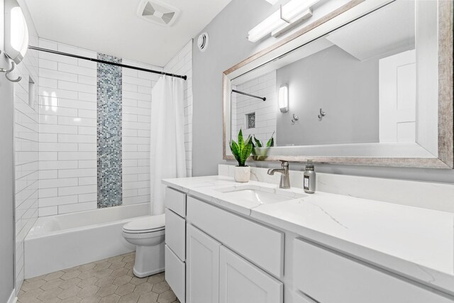 907 7th Ave, Wanamingo, MN 55983 - bathroom featuring vanity, shower / tub combo, toilet, tile patterned floors, and an AC wall unit