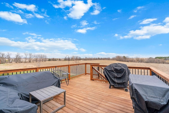 907 7th Ave, Wanamingo, MN 55983 - wooden terrace featuring a view of rural / pastoral area and area for grilling