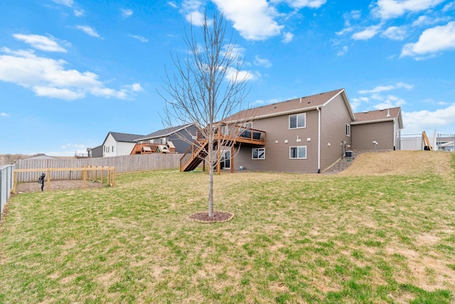 907 7th Ave, Wanamingo, MN 55983 - back of property featuring a deck and stairs