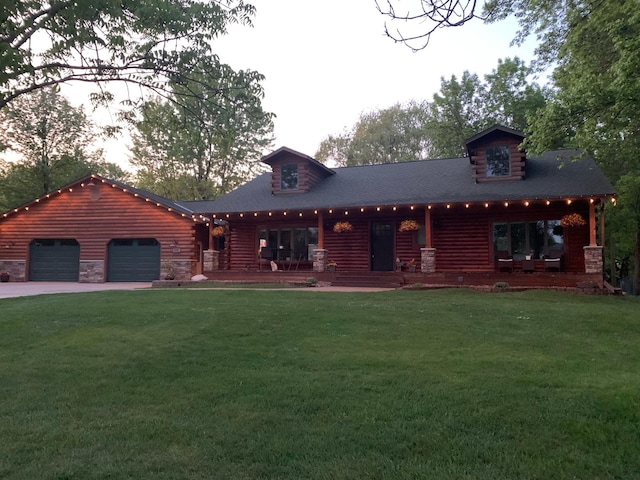 631 Pheasant Run, Winsted, MN 55395 - log-style house featuring a front lawn, a garage, driveway, and log exterior