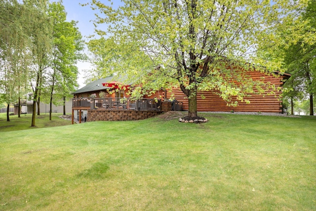 631 Pheasant Run, Winsted, MN 55395 - view of grassy yard featuring a wooden deck