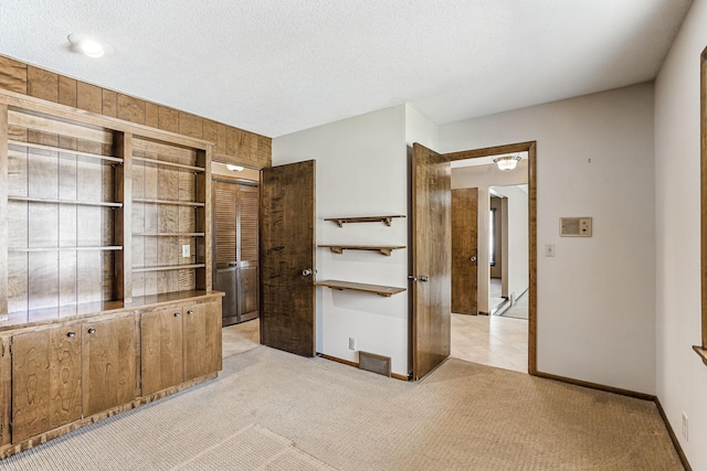 5411 Southwood Dr, Bloomington, MN 55437 - interior space featuring baseboards, visible vents, and light carpet