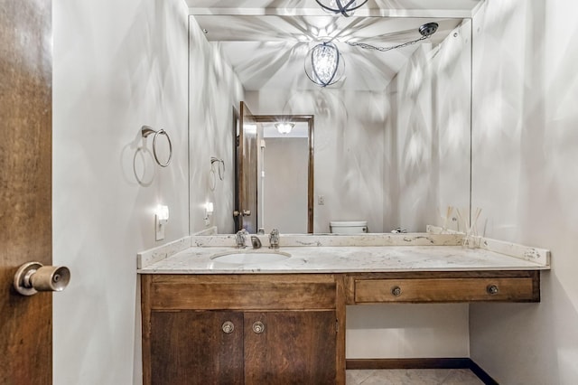 5411 Southwood Dr, Bloomington, MN 55437 - half bathroom with tile patterned floors, baseboards, and vanity